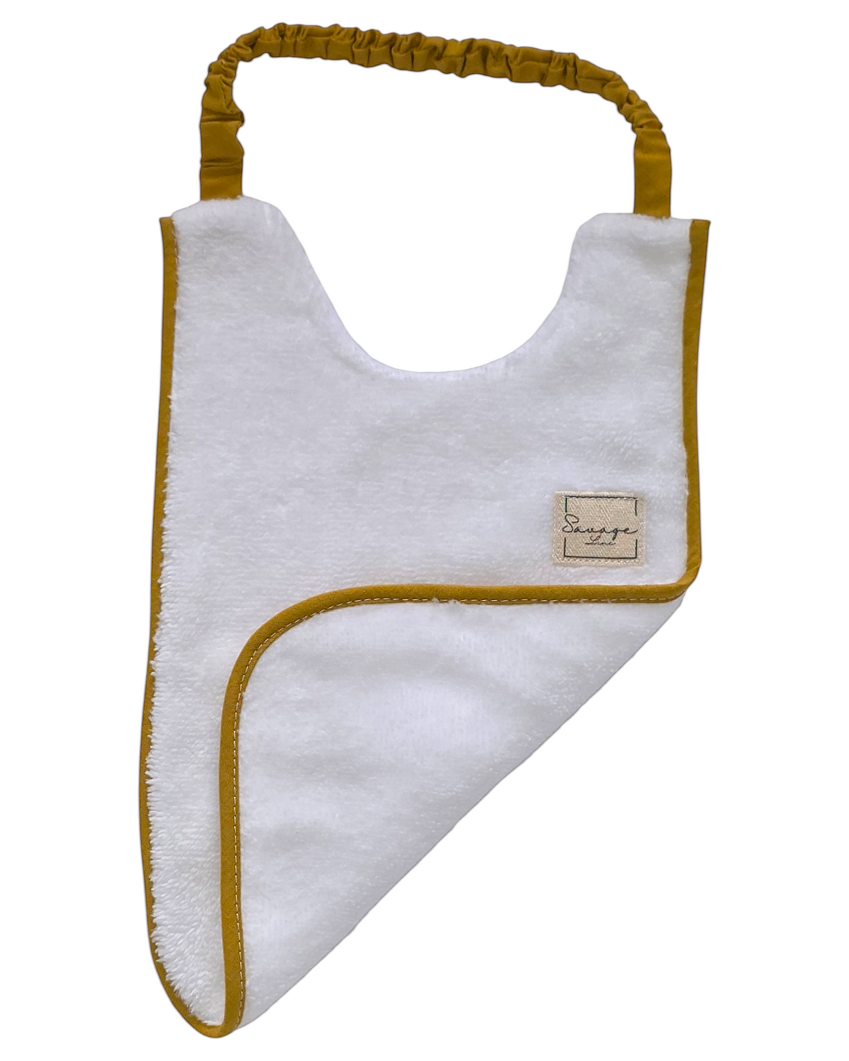 Babero SAVAGE LINE de rizo de bambú blanco con ribete y elástico color mostaza, diseño Montessori ajustable