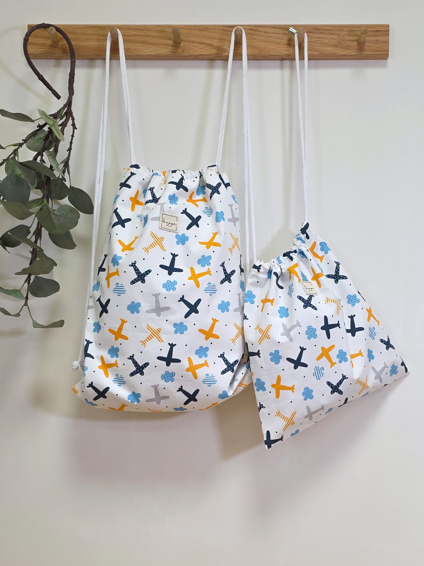 Dúo mochila muda y multiusos "AVIONETAS"