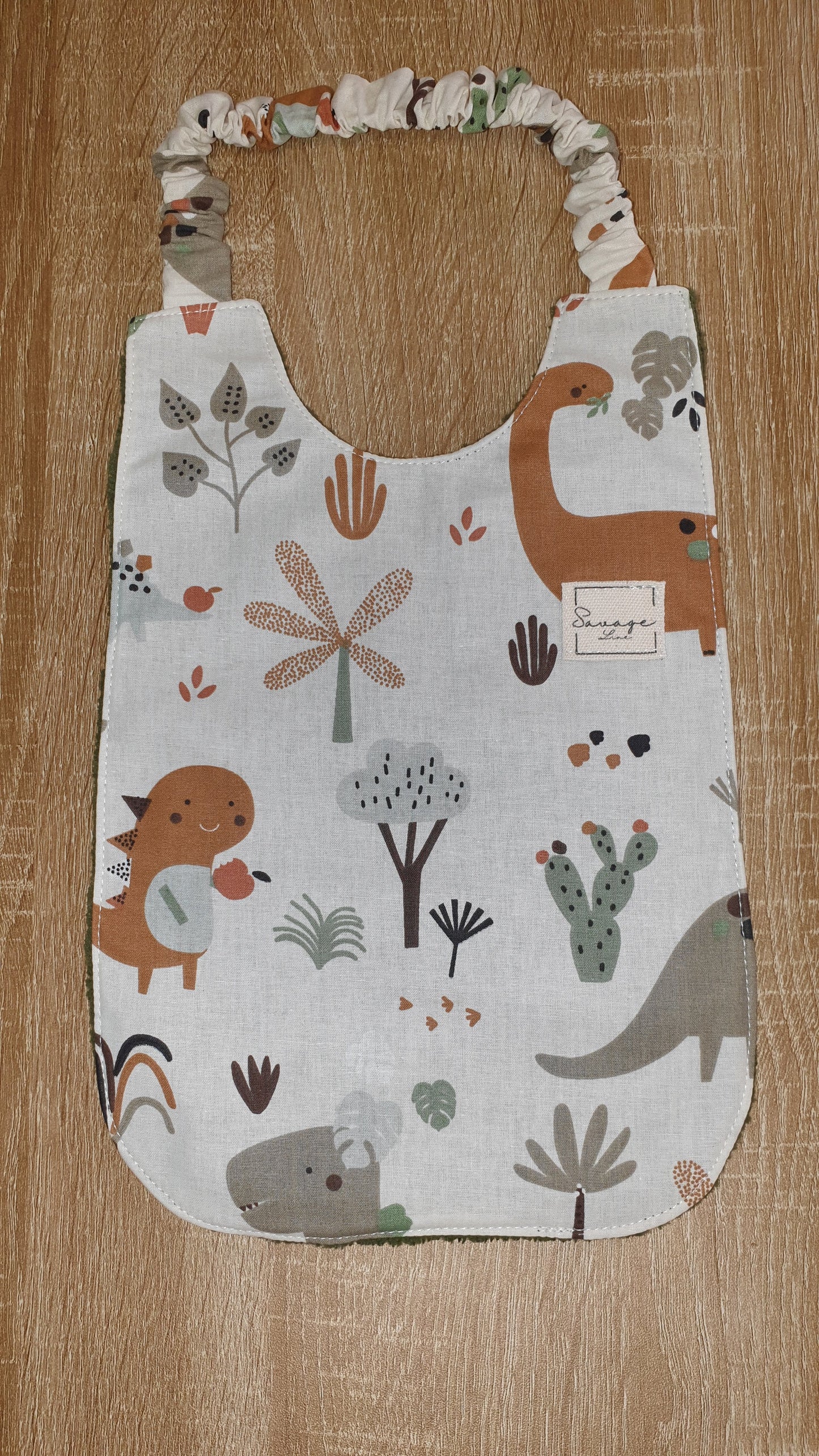 Baberos Montessori "DINOS DESIERTO"