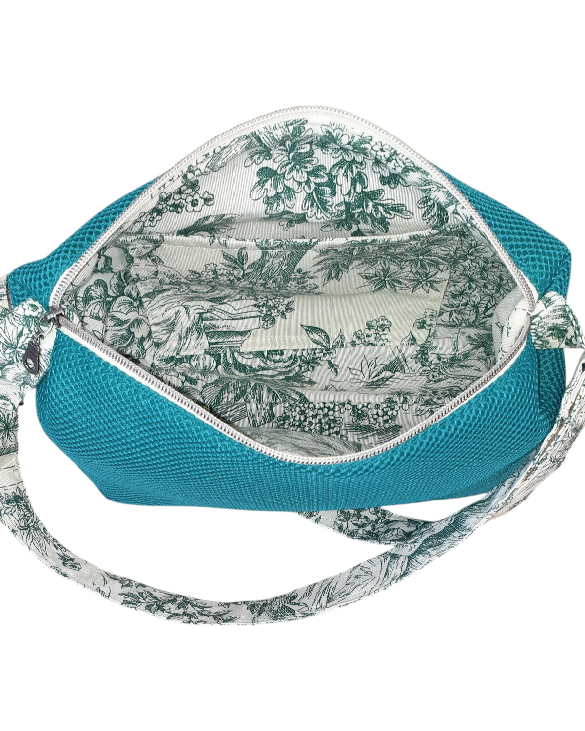 Bandolera SAVAGE LINE Sara Cross de mesh 3D verde con forro interior estampado floral y correa de loneta a juego