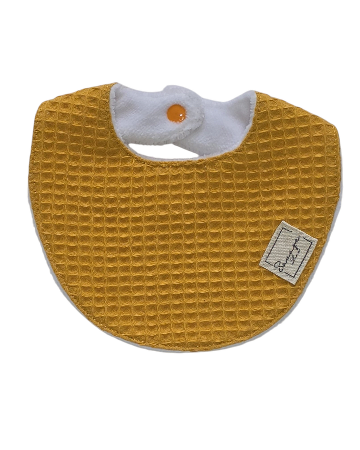 Babero de lactancia SAVAGE LINE color ocre con tejido waffle de algodón y reverso de rizo de bambú antibacteriano