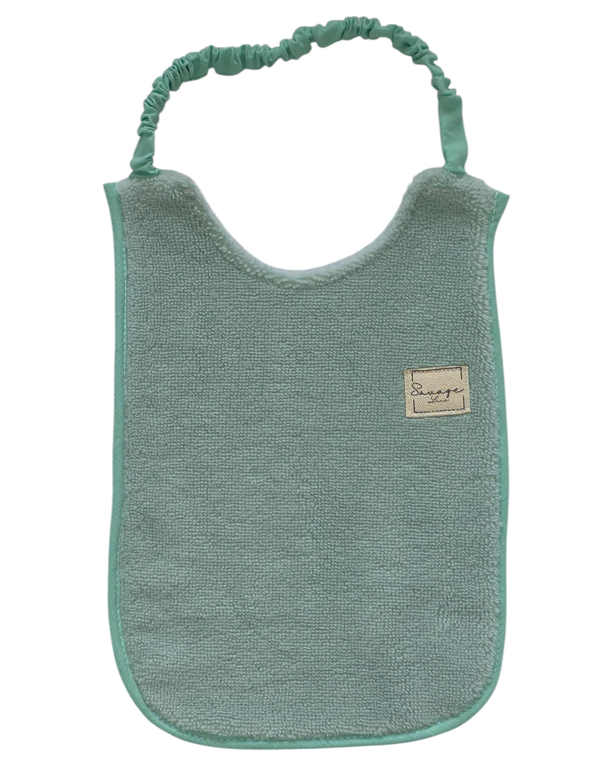 Babero SAVAGE LINE de rizo de bambú color verde menta con diseño elástico ajustable para bebés de 6 a 12 meses