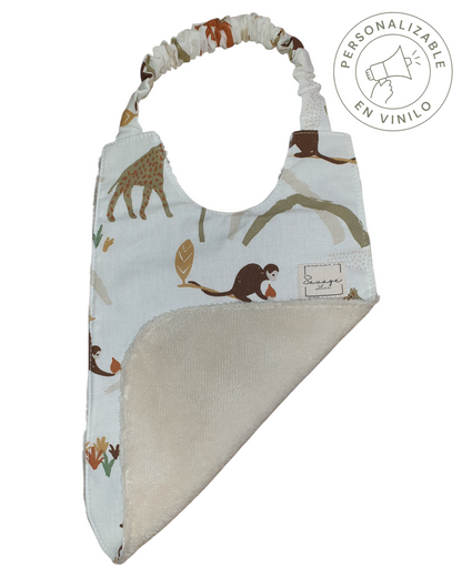 Babero Montessori SAVAGE LINE de algodón orgánico con estampado de jungla y reverso de rizo de bambú antibacteriano.