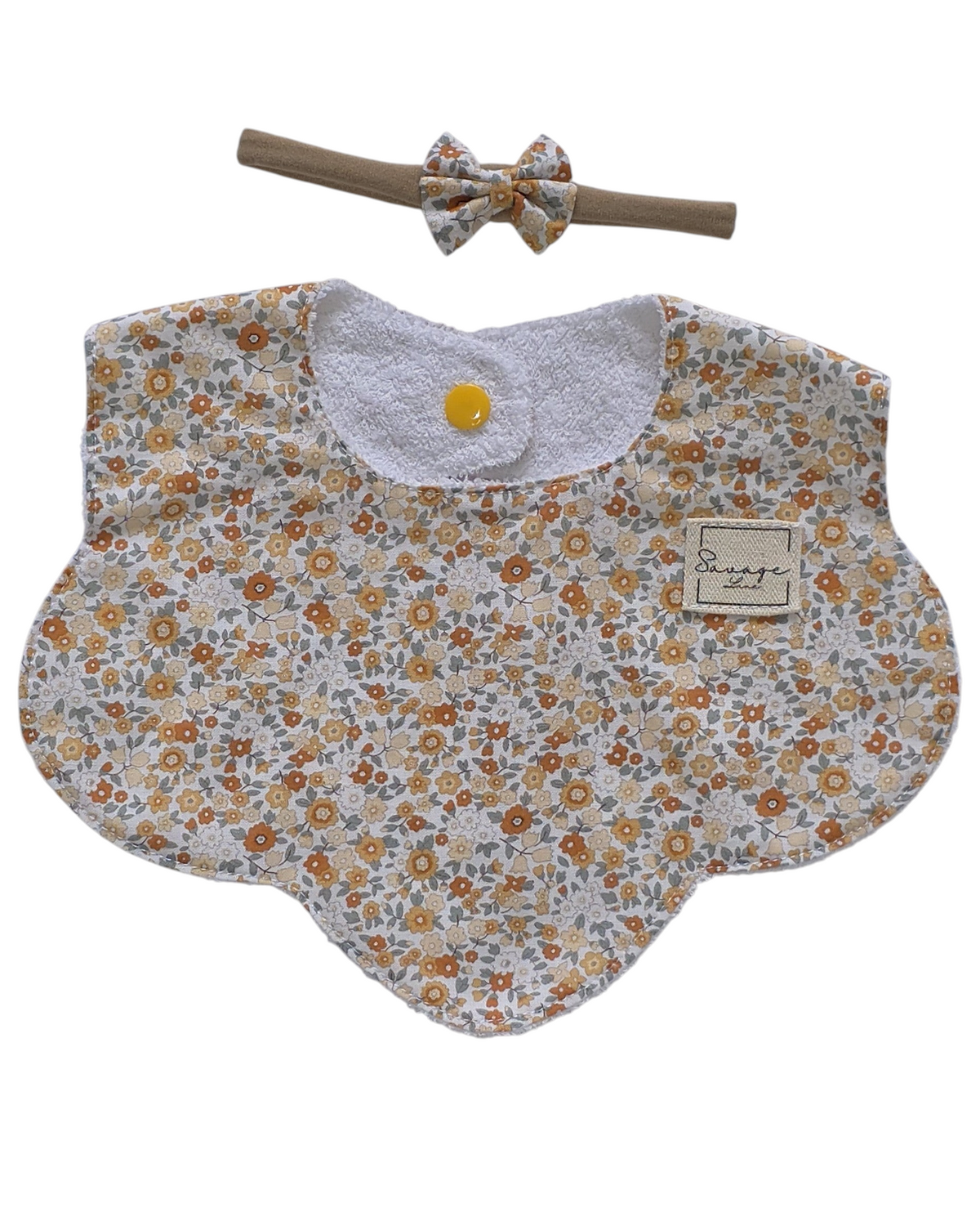 Conjunto SAVAGE LINE de babero y diadema para bebé con estampado floral vintage en tonos naranja y algodón absorbente
