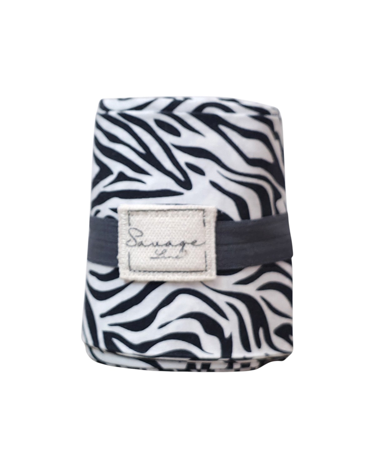 Bolsa plegable artesanal SAVAGE LINE estilo japonés con estampado de cebra en popelín, talla S, enrollada y compacta.