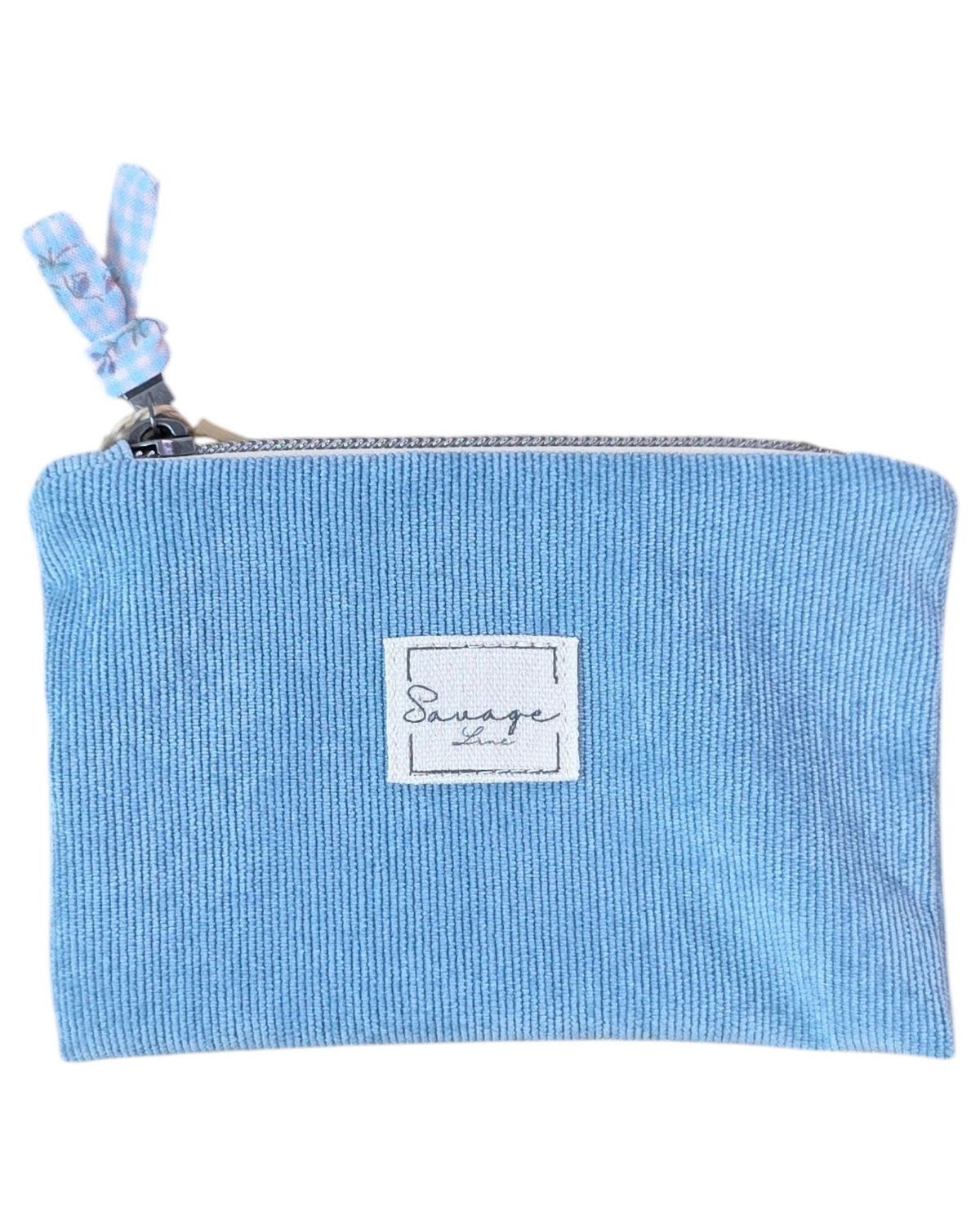 Monedero SAVAGE LINE Classic de pana azul claro con etiqueta de marca y cremallera con detalle de tela a cuadros
