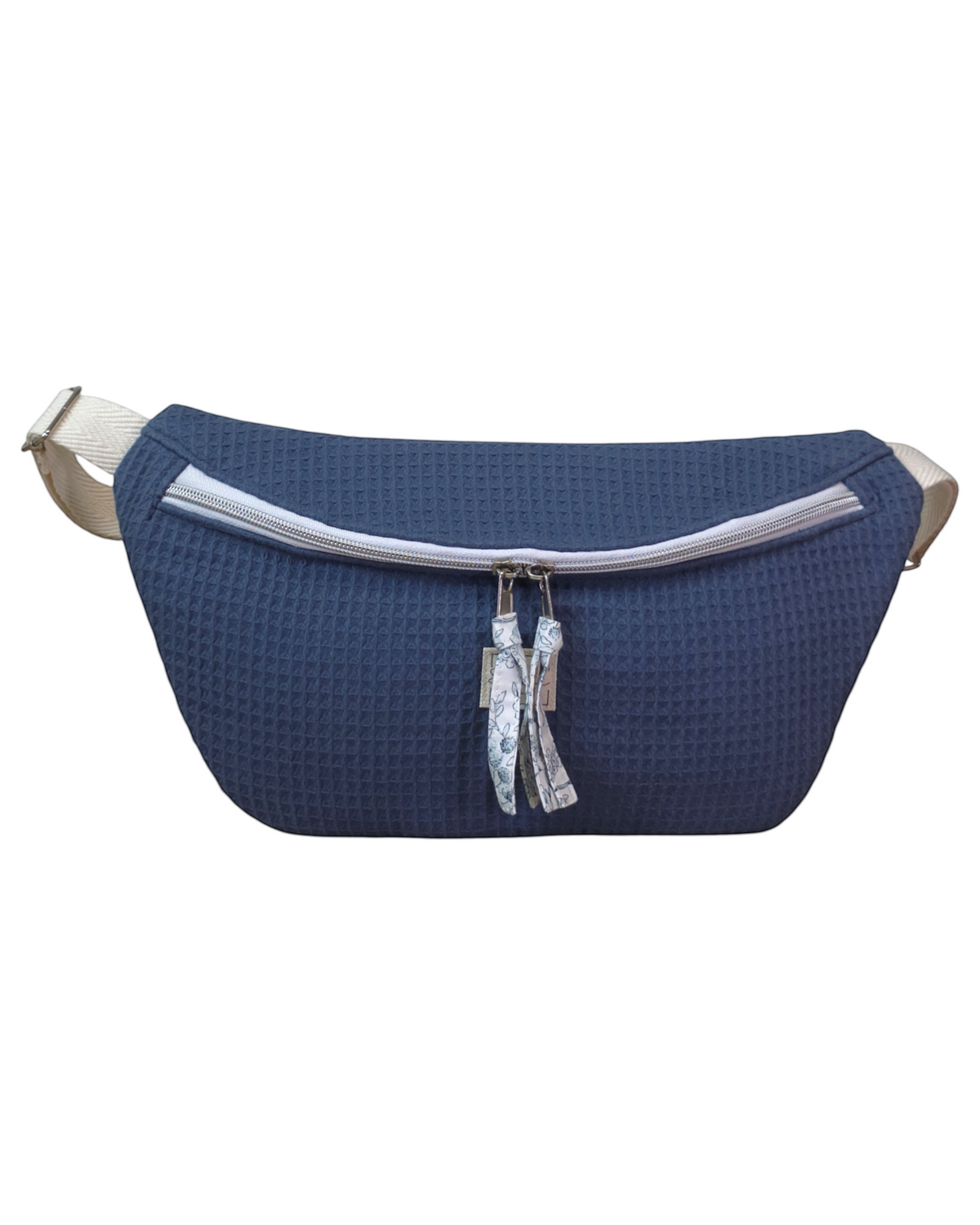 Riñonera artesanal SAVAGE LINE modelo Micka en tejido waffle azul con cremallera y correa ajustable