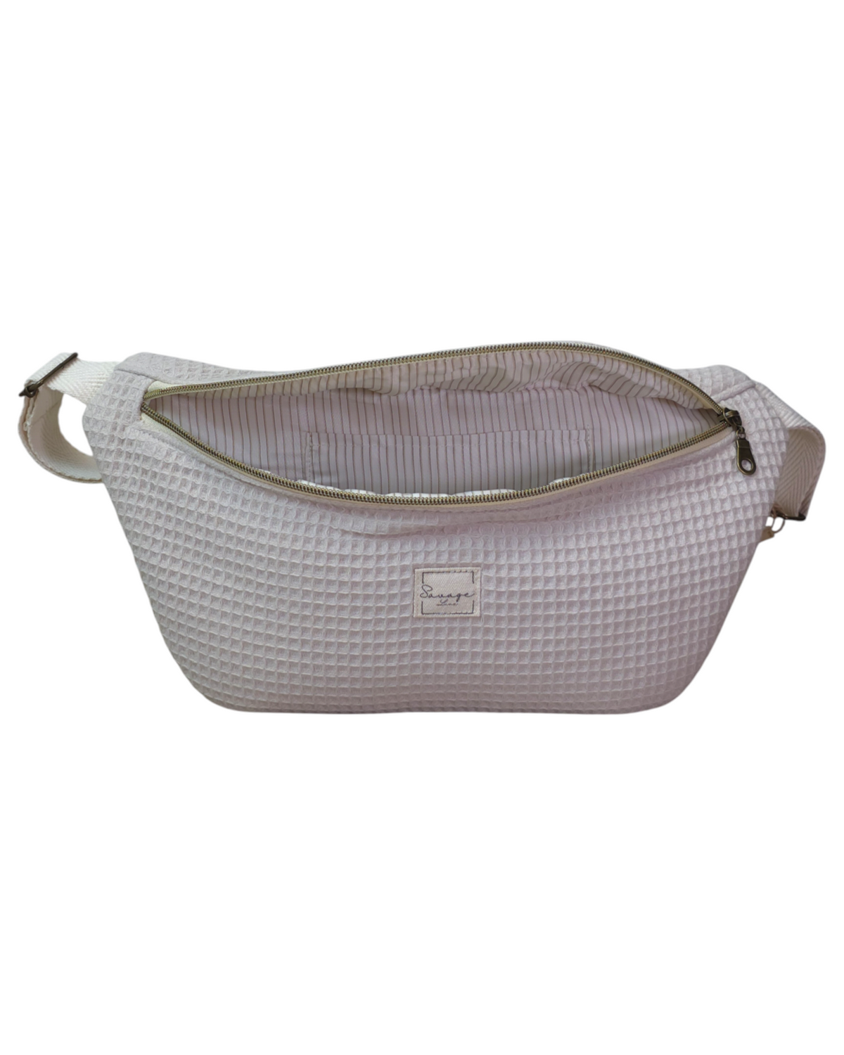 Riñonera artesanal SAVAGE LINE modelo Micka en tejido waffle color beige con forro de algodón y correa ajustable
