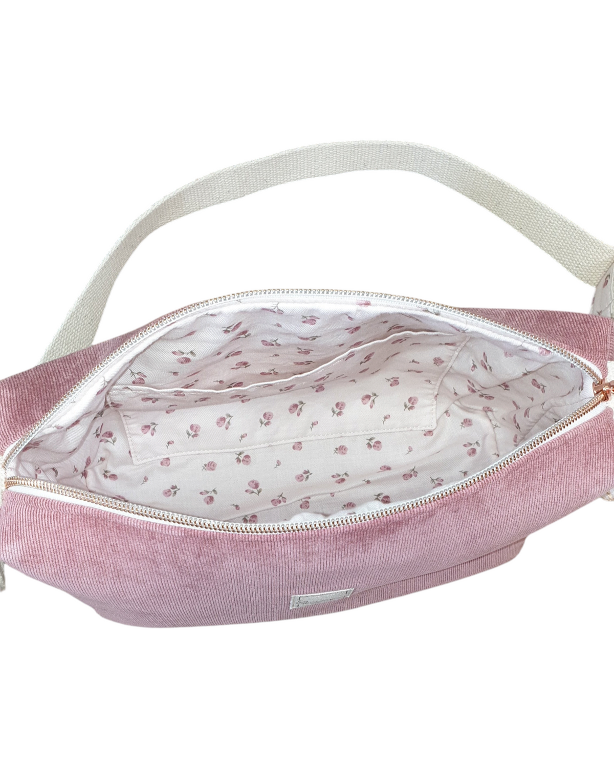 Bandolera SAVAGE LINE Sara Cross en pana rosa empolvado con forro interior estampado floral y correa de algodón