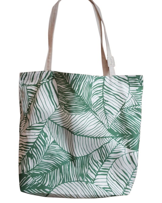 Bolso tote artesanal SAVAGE LINE de algodón con estampado de hojas de plátano en verde y blanco